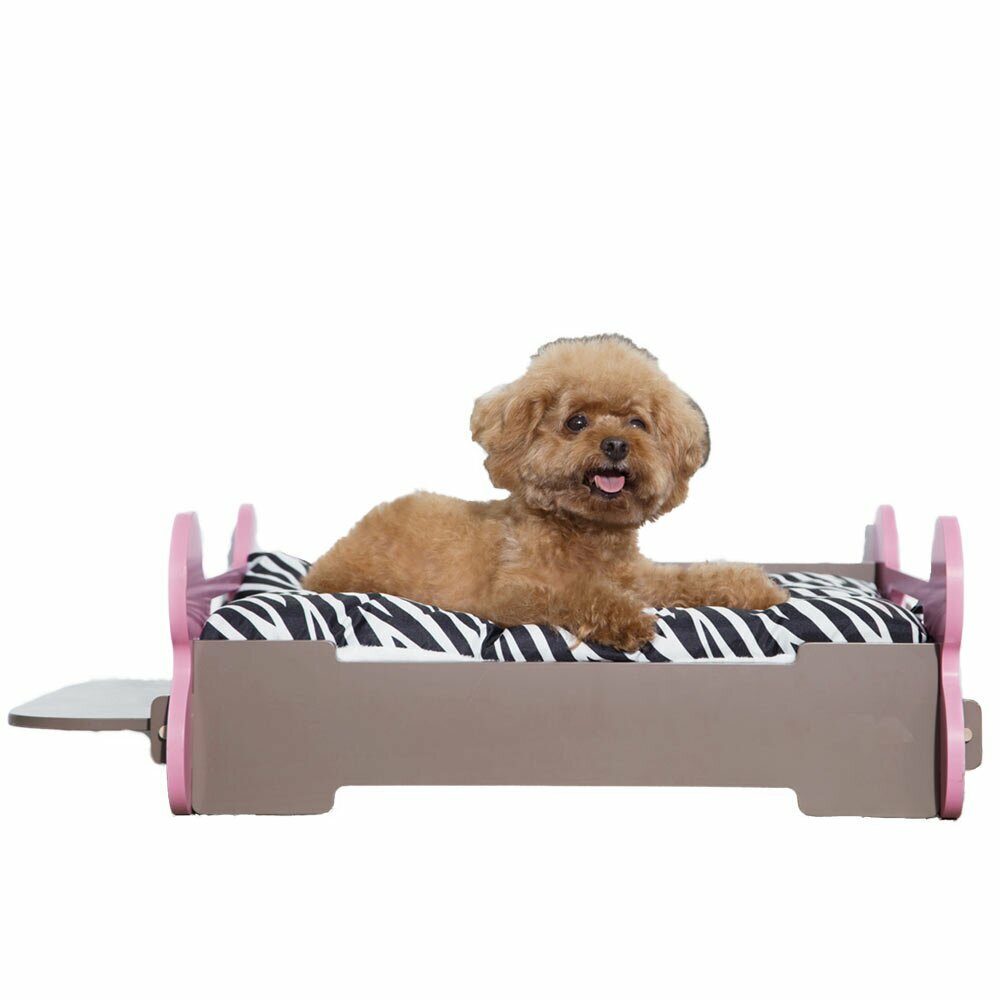 Holzbett für Hunde mit rosa Fußenden in knochenform